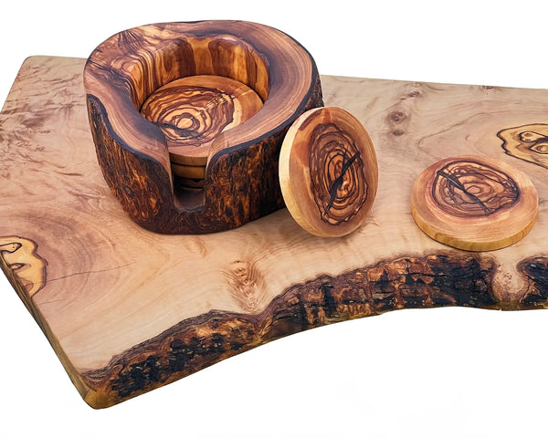 Set of wooden drink coasters made from live edge olive wood with a rustic holder. Features a vintage design with unique natural grain patterns, perfect for protecting surfaces and adding charm to table decor